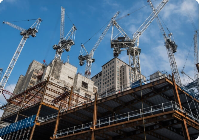 Large Construction Site with a number of cranes in a city setting