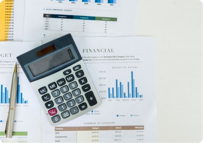 Calculator and financial diagram for a small construction business