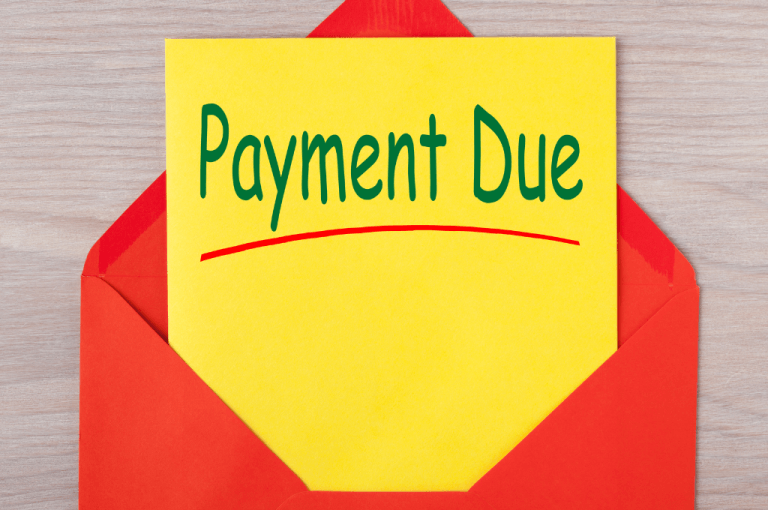 Letter with card spelling out Payment Due for a payment reminder needing to be send